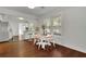 Dining area featuring hardwood floors and adjacent open kitchen with stainless steel appliances at 265 Haas Se Ave, Atlanta, GA 30316