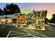 Vibrant Wylie & Rum restaurant exterior featuring stylish lighting, inviting patio, and grand opening sign at 265 Haas Se Ave, Atlanta, GA 30316