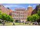 Spacious Ponce City Market exterior featuring a park with people enjoying the outdoors on a sunny day at 265 Haas Se Ave, Atlanta, GA 30316