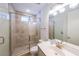 Well-lit bathroom with tiled shower, glass door, modern vanity and sink, offering a clean and stylish design at 419 Hargrove Ln, Decatur, GA 30030