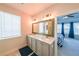Elegant bathroom with double sinks, marble countertops, and a large mirror at 419 Hargrove Ln, Decatur, GA 30030