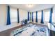 Versatile room with ample natural light, an accent rug, a workspace, and access to the outside at 419 Hargrove Ln, Decatur, GA 30030