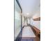 Welcoming foyer featuring hardwood floors, a staircase, bench and coat rack at 419 Hargrove Ln, Decatur, GA 30030