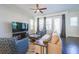 Cozy living room with comfortable seating, large windows, and hardwood floors at 419 Hargrove Ln, Decatur, GA 30030
