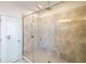 Modern shower with glass door, tiled walls, and rainfall showerhead at 419 Hargrove Ln, Decatur, GA 30030