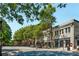 Street view showcasing local businesses and retail with tree-lined street and storefront parking at 419 Hargrove Ln, Decatur, GA 30030