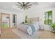 The main bedroom offers an en-suite bathroom, large windows, and abundant natural light at 840 Old Driver Road, Whitesburg, GA 30185
