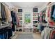 Organized walk-in closet with ample shelving, hanging space, and a view to outdoors at 840 Old Driver Road, Whitesburg, GA 30185