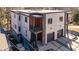 Modern home featuring a two-car garage, stone accents, and balconies at 147 Hutchinson Ne St, Atlanta, GA 30307
