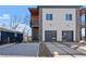 Contemporary home with a two-car garage, stone accents, and modern design at 147 Hutchinson Ne St, Atlanta, GA 30307
