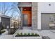 Modern front entrance featuring stone accents and wood ceiling at 147 Hutchinson Ne St, Atlanta, GA 30307
