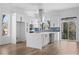 Modern kitchen features white cabinets, stainless steel appliances, and a kitchen island at 147 Hutchinson Ne St, Atlanta, GA 30307
