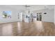 Open-concept living and kitchen area with hardwood flooring and modern appliances, great for entertaining at 147 Hutchinson Ne St, Atlanta, GA 30307