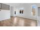 Bright, open living area with hardwood floors and ample natural light from large windows at 147 Hutchinson Ne St, Atlanta, GA 30307