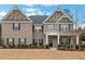 Charming two-story brick home with stone accents and a welcoming front porch at 3759 Chapel Cv, Douglasville, GA 30135
