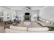 Spacious living room with a stone fireplace and a comfortable seating area at 3759 Chapel Cv, Douglasville, GA 30135