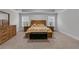 Spacious main bedroom showcasing a large bed and matching nightstands and dresser at 3759 Chapel Cv, Douglasville, GA 30135