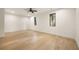 Bright bedroom with hardwood floors and large windows for lots of natural light at 6178 Lake Lanier Heights Road, Buford, GA 30518