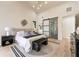Serene bedroom boasts high ceilings, modern lighting, and access to the luxurious en-suite at 6178 Lake Lanier Heights Road, Buford, GA 30518