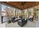 Inviting outdoor living space features stylish furnishings and scenic lake views at 6178 Lake Lanier Heights Road, Buford, GA 30518