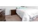 Comfortable bedroom with soft carpet, neutral tones, and elegant dark wood accents at 269 Whitetail Cir, Canton, GA 30115