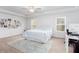 This spacious bedroom includes ample natural light and carpet flooring at 269 Whitetail Cir, Canton, GA 30115