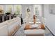 Dining room featuring large windows and modern decor and a view into the living room at 269 Whitetail Cir, Canton, GA 30115