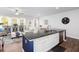 Kitchen island with granite countertop overlooking the living room area at 269 Whitetail Cir, Canton, GA 30115