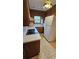 The kitchen boasts a classic design with wood cabinetry and an electric range at 4112 Bontura Ct, Stone Mountain, GA 30083