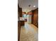 The kitchen boasts a classic design with wood cabinetry and an electric range at 4112 Bontura Ct, Stone Mountain, GA 30083