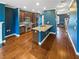 Spacious kitchen boasts granite countertops, stainless steel appliances, and hardwood floors at 4954 Wyeth Way, Alpharetta, GA 30022