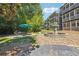This apartment complex features a beautiful fountain and outdoor seating area at 1445 Monroe Ne Dr # A12, Atlanta, GA 30324