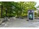 Inviting community entrance with manicured landscaping, featuring a map kiosk at 1445 Monroe Ne Dr # A12, Atlanta, GA 30324