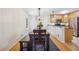 Charming dining room with modern lighting fixture with stainless steel appliances at 1445 Monroe Ne Dr # A12, Atlanta, GA 30324