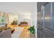 Inviting entryway with a striking door and a view of the living and dining areas at 1445 Monroe Ne Dr # A12, Atlanta, GA 30324