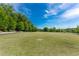 Expansive green space with lush lawn and mature trees, perfect for recreation and relaxation at 1445 Monroe Ne Dr # A12, Atlanta, GA 30324