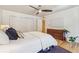 The main bedroom includes a ceiling fan, closet and hard wood floors at 1445 Monroe Ne Dr # A12, Atlanta, GA 30324