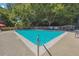 Inviting community pool surrounded by lush greenery and lounge chairs for relaxing on sunny days at 1445 Monroe Ne Dr # A12, Atlanta, GA 30324