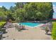 Enjoy the outdoors at this sparkling community pool with tables and chairs for entertaining at 1445 Monroe Ne Dr # A12, Atlanta, GA 30324