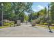 Take a stroll along this scenic, tree-lined walkway with stone pillars and lush greenery at 1445 Monroe Ne Dr # A12, Atlanta, GA 30324