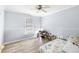 Cozy bedroom featuring light-colored walls and plenty of natural light at 3261 Hidden Forest Dr, Snellville, GA 30078