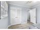 Serene bedroom features wood-look floors and a window offering natural light at 3261 Hidden Forest Dr, Snellville, GA 30078