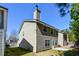 Back exterior view of home with a patio and chimney at 5592 Bluegrass Dr, Atlanta, GA 30349