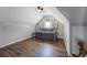 Cozy bedroom features wood floors, neutral paint, and ceiling fan at 20 Alison Trail, Covington, GA 30014