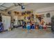 Spacious garage with ample storage, shelving, and room for multiple vehicles at 20 Alison Trail, Covington, GA 30014