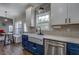 This kitchen features stainless steel appliances, tiled backsplash, and an adjacent breakfast nook at 20 Alison Trail, Covington, GA 30014