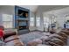 Open-concept living area featuring a fireplace and seamless flow into the kitchen at 20 Alison Trail, Covington, GA 30014