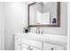 Bathroom features a marble countertop and a framed mirror at 3150 Shumard Way, Marietta, GA 30064