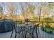 Outdoor patio and deck space with a table, chairs, and a grill for entertaining at 3150 Shumard Way, Marietta, GA 30064