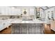 Bright, modern kitchen featuring a central island with seating and stainless steel appliances at 3150 Shumard Way, Marietta, GA 30064
